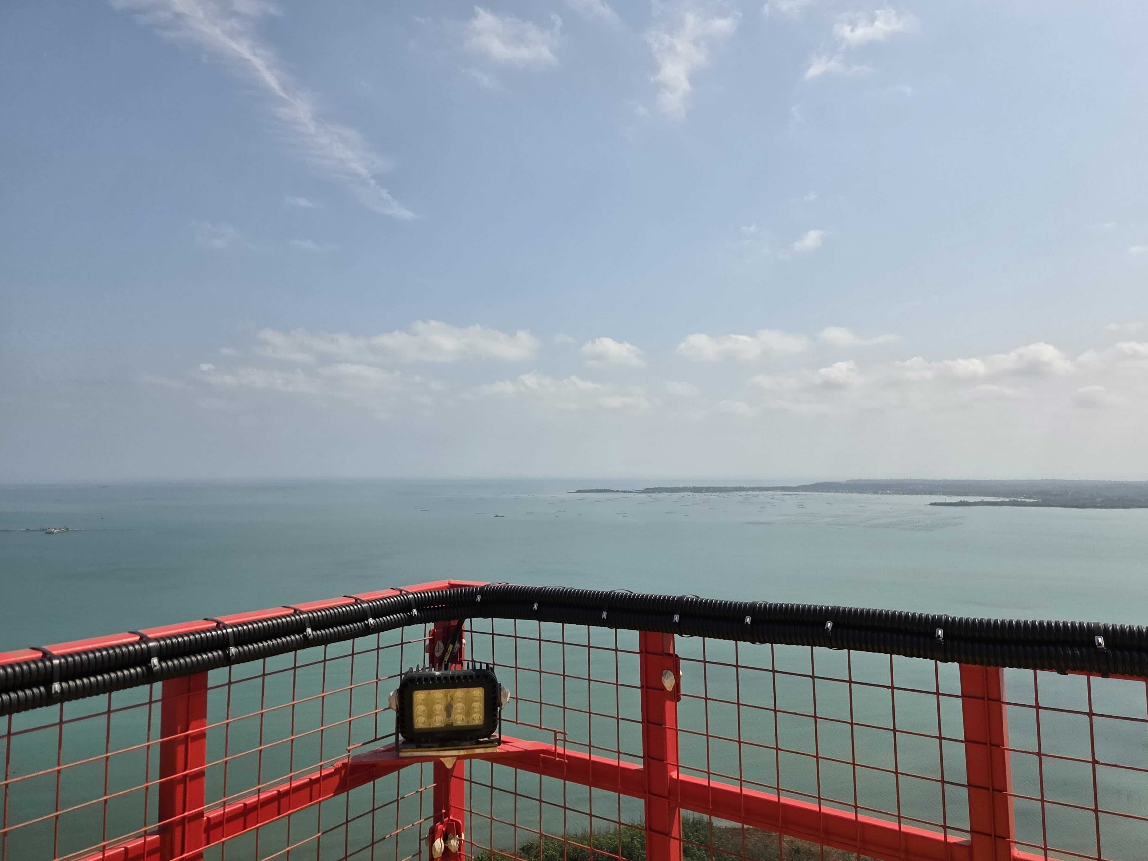 Offshore wind turbines on the horizon from a vessel